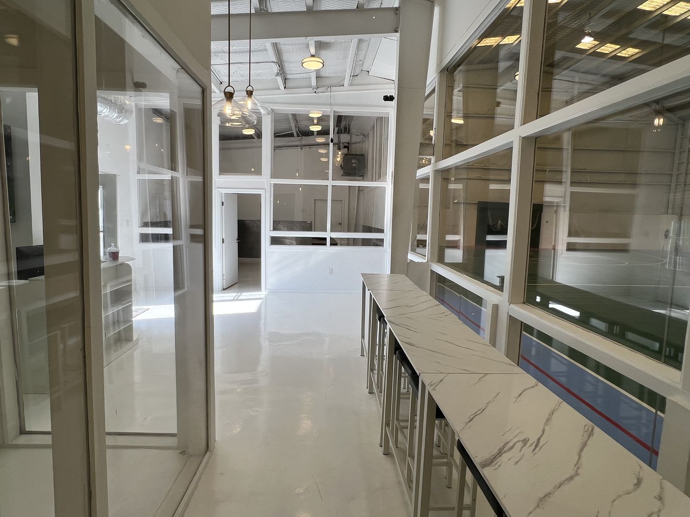 Viewing lounge with counter seating along the glass